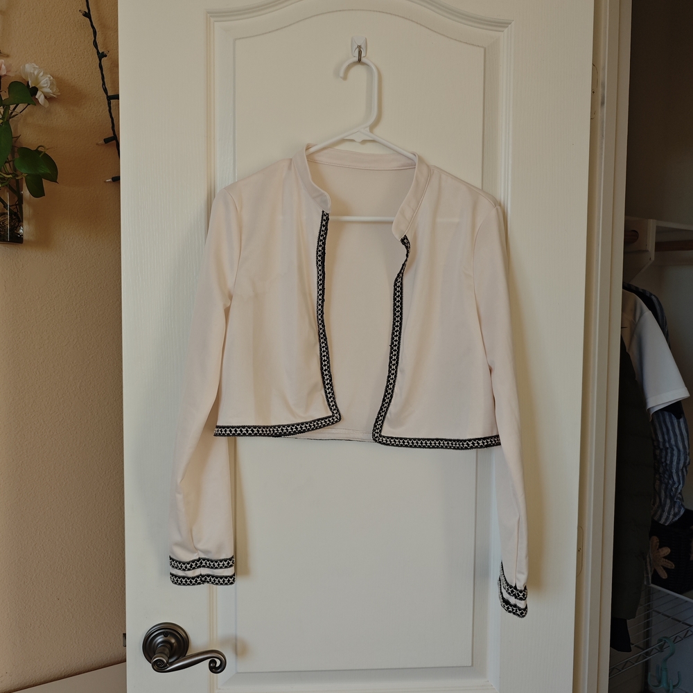 Elegant Cream Women's Jacket with Black Trim